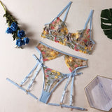Ensemble porte-jarretelle bleu en dentelle fleurie