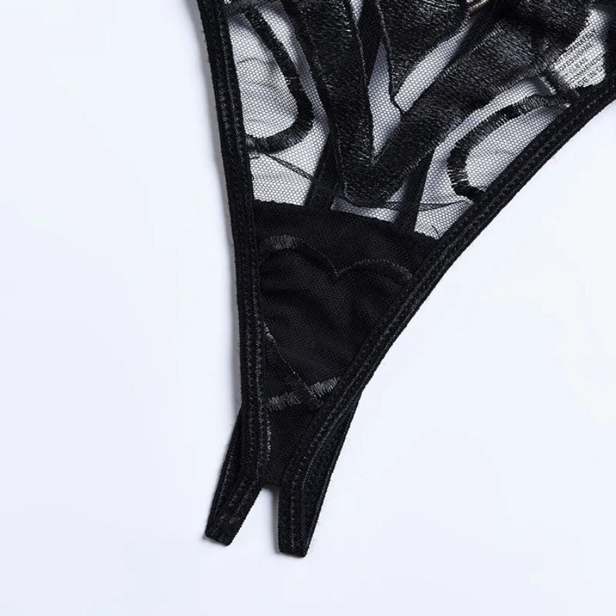 Ensemble porte-jarretelle noir avec string ouvert
