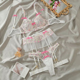 Ensemble porte-jarretelle blanc en dentelle fleurie