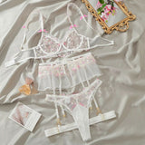 Ensemble porte-jarretelle blanc en dentelle fleurie